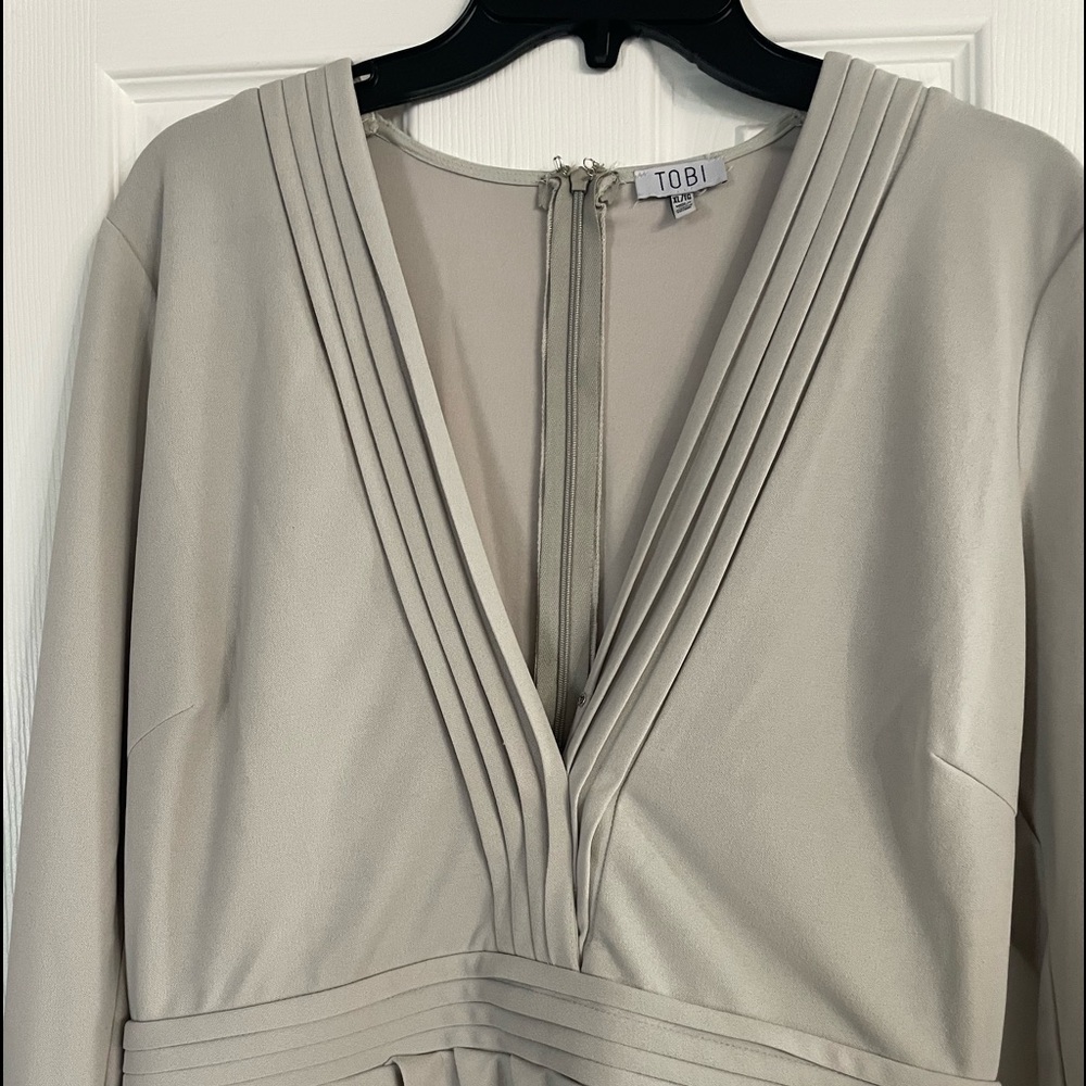 Body-con style muted gray v neck dress
